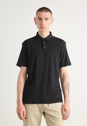 CHEST - Poloshirt - black