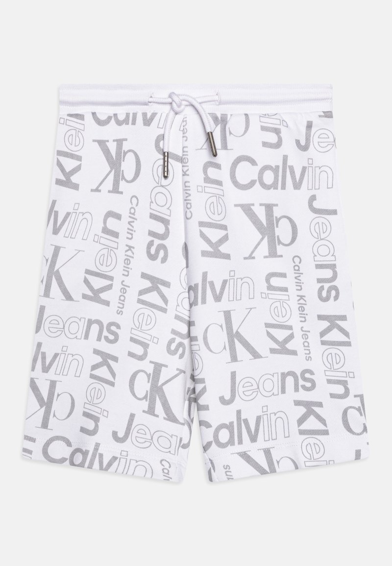Short blanc à cordon avec texte du logo Calvin Klein Jeans gris sur toute la surface et initiales "ck" en différentes polices et tailles.