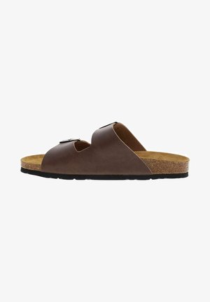 Sandale à glisser en cuir marron avec deux sangles ajustables, semelle en liège et semelle en caoutchouc noir. Présente une texture lisse et un design minimaliste.