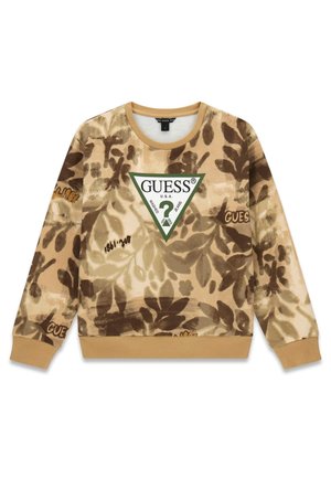 Beige-brauner Sweatshirt mit Blättermuster, Rippbündchen an Ärmeln und Saum, mit großem grünem Dreieck-Logo von GUESS und Text in der Mitte.