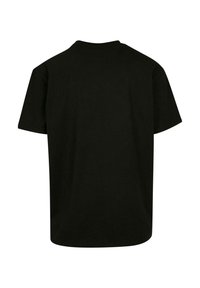 Sort bomulds T-shirt med klassisk rund hals, korte ærmer og en afslappet pasform. Enkel design uden mønstre eller prikker.