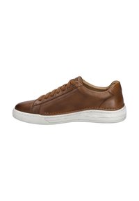 Brown leather sneaker with a white rubber sole, featuring lace-up closure, rounded toe, and contrasting stitching along the side.