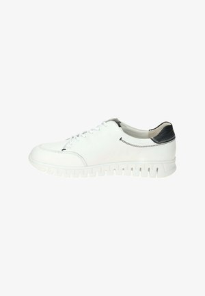 White leather sneaker with a rounded toe, lace-up front, and textured black heel accent. Features a flexible white rubber sole with grooves.