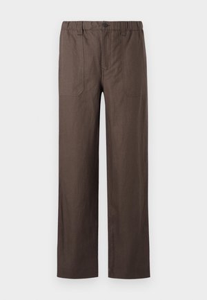 Brown, wide-leg pants made from a lightweight fabric. Features an elastic waistband and two front pockets with rectangular stitching accents.