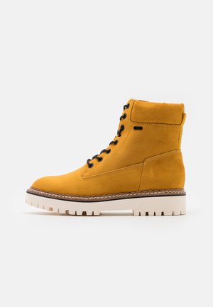 Stivaletti stringati - yellow