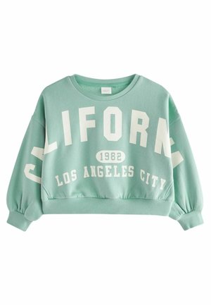 Miętowo-zielona krótka bluza z bufkami na rękawach, ściągaczami na mankietach oraz białym napisem "CALIFORNIA 1982 LOS ANGELES CITY" na przodzie.