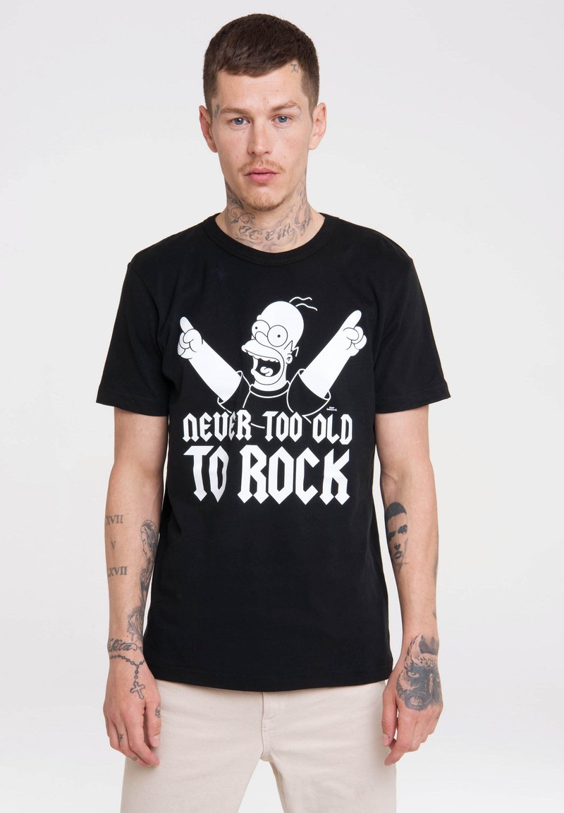 Black cotton t-shirt featuring a graphic of a cartoon character with outstretched arms and the text "NEVER TOO OLD TO ROCK" in white.