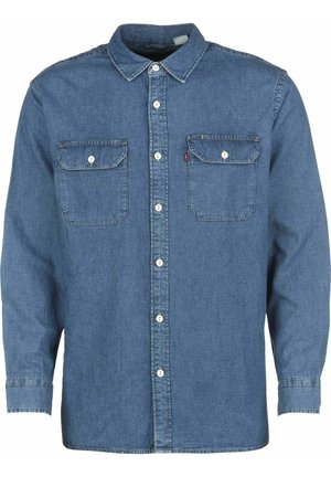 Pitkähihainen sininen farkkupaita, jossa on napillinen etuosa, kaksi napillista rintataskua ja klassinen kaulus.