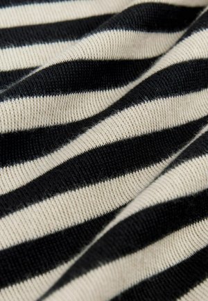 Tissu tricoté à rayures noires et crème, présentant des rayures larges alternées avec une texture douce et lisse et un léger effet extensible.