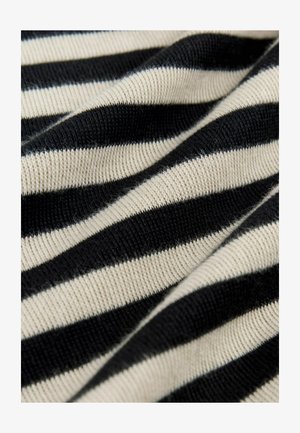 Tesătură tricotată în dungi negre și crem, cu dungi late alternative, având o textură moale, netedă și o ușoară elasticitate.