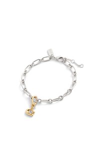 Pulsera de cadena de plata con eslabones ovalados, cierre de oro con un acento de diamante y una cadena ajustable para personalizar la longitud.