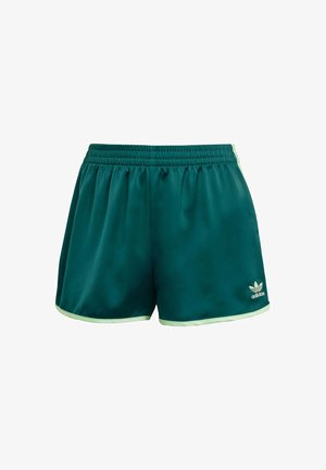 Pantalones cortos de satén verdes con una cintura elástica, que presentan acentos de color verde claro a lo largo del dobladillo y un logotipo blanco de Adidas en la parte inferior.