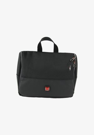 Sac en tissu noir de forme rectangulaire, avec une poignée supérieure, une fermeture éclair, et un petit logo rouge sur le panneau avant.