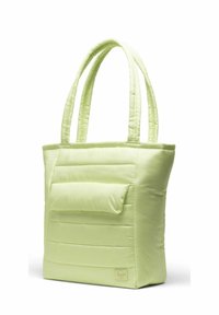 Sac fourre-tout matelassé en nylon vert clair, doté de deux longues anses et d'une poche avant avec rabat. Texture lisse avec des détails cousus.