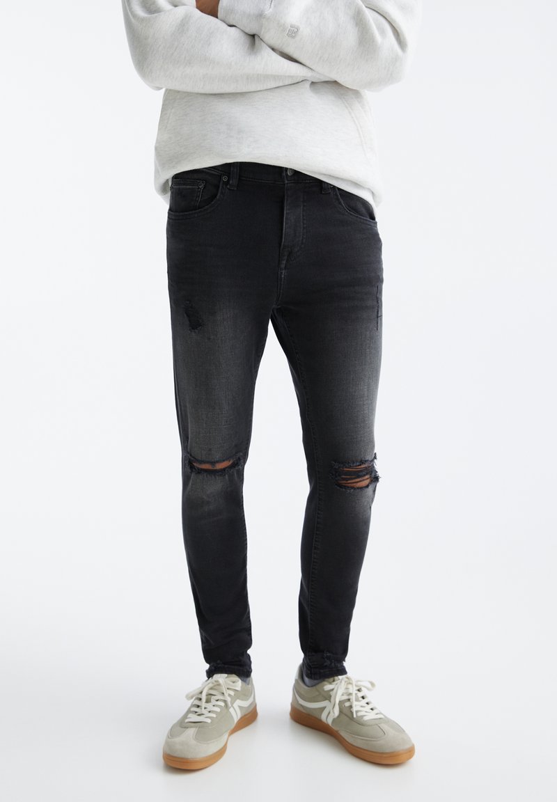 PULL&BEAR RIPPED SUPER Jeans Skinny Fit black/schwarz Zalando.ch