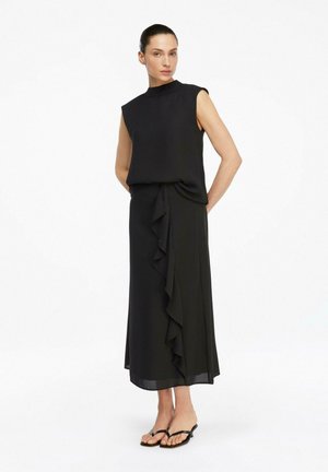 - Spódnica trapezowa