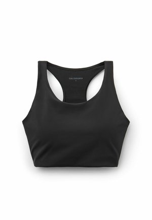 Sort sports-bh lavet af strækbart materiale. Har en rund udskæring og brede skulderstropper. Mærket indeni læser "CALZEDONIA" med størrelse "S."