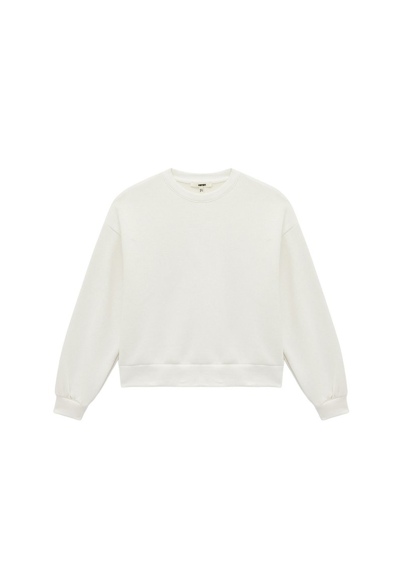 Hvid cropped sweatshirt lavet af blødt stof, med rund halsudskæring, lange ærmer med elastiske manchetter og ribbede kanter.