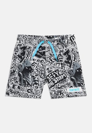 Schwarz-weiße Fortnite-Shorts mit blauen Kordelzügen, gestaltet mit grafischem Text und Illustrationen eines Figuren mit Kapuze.