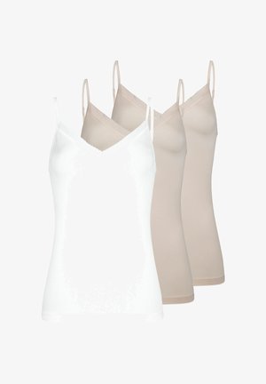 Trois camisoles sans manches avec bordure en dentelle sur les bretelles fines, une blanche au premier plan et deux beiges derrière sur un fond blanc.