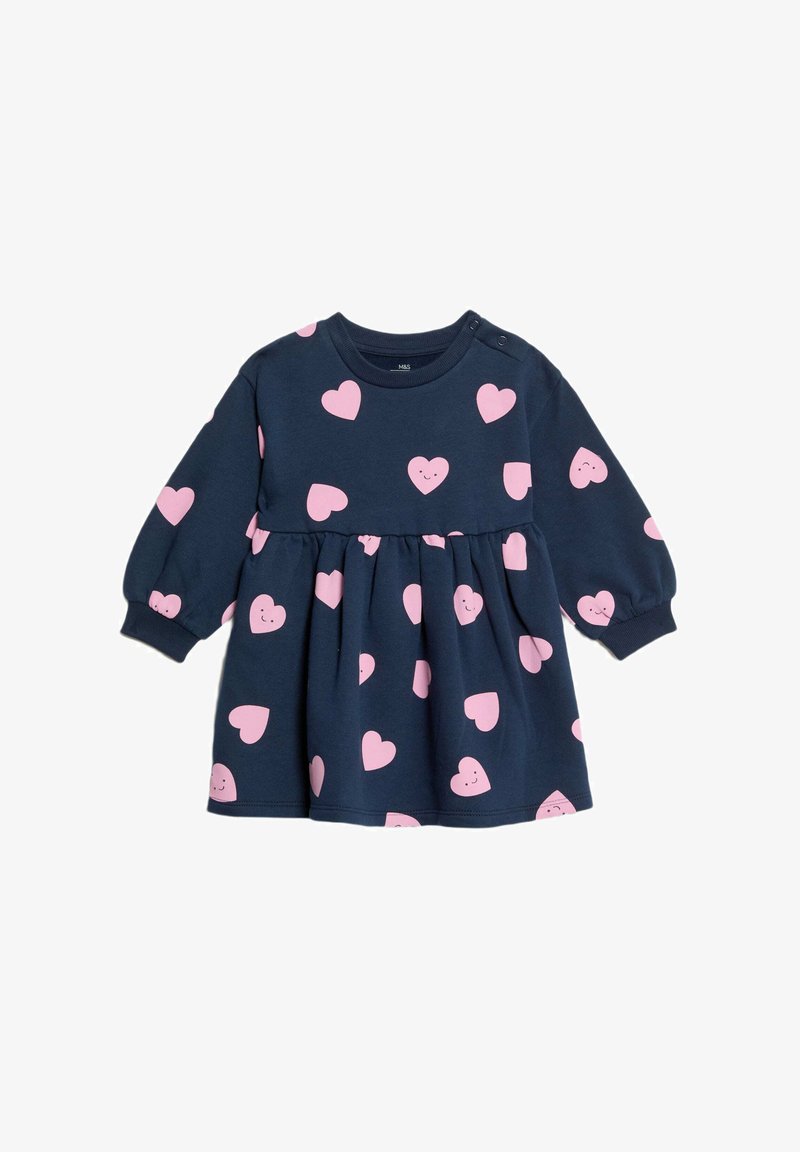 Robe en coton bleu marine à manches longues, présentant une jupe froncée et des motifs de cœurs roses dispersés avec de petits visages souriants.