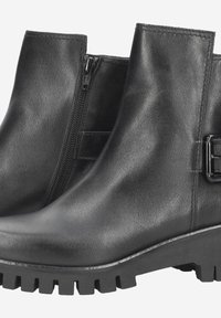 Black leather ankle boots featuring a zip closure and a prominent buckle detail. Robust treaded sole for enhanced grip.