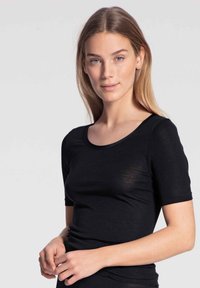 Black fitted t-shirt in lightweight fabric, featuring a round neckline and short sleeves. Smooth texture with a classic silhouette and minimal details.