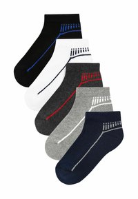 Cinco pares de calcetines cortos en negro, blanco, gris, marino y carbón, con rayas de colores y diseños de talón en contraste.