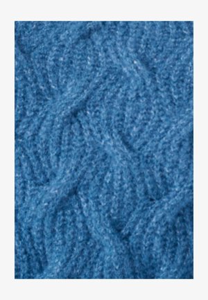 Getextureerde blauwe stof met een patroon van in elkaar grijpende golven. Het materiaal lijkt zacht en pluizig, met subtiele schaduwvariaties.