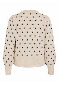 Pull tricoté crème à pois noirs, manches longues bouffantes, ourlet côtelé et encolure ronde, vu de dos.