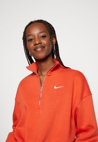 Nike Sportswear CROP - Camisola - mantra orange