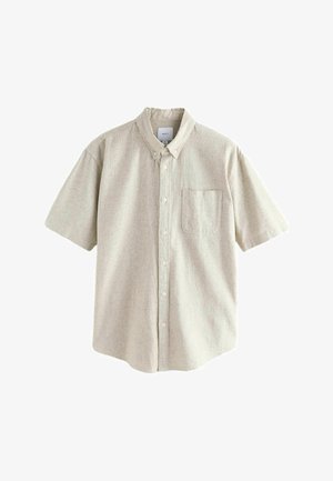 Srajca s kratkimi rokavi iz svetlo bež tkanine z ovratnikom na gumbe, žepom spredaj in teksturiranim, tkanim vzorcem.