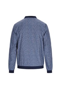 Marineblaues Jackett mit floralem Muster in Hellblau, Rot und Grün. Es hat einen gerippten Kragen und Bündchen sowie lange Ärmel mit einem lässigen Schnitt.