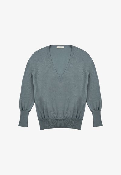 V-Ausschnitt Strickpullover in einem sanften Teal-Ton. Mit Ballonärmeln, gerippten Bündchen und Saum sowie einem weichen, strukturierten Stoff.