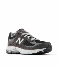Gray suede running shoe with mesh accents, white logo, and laces. Features a cushioned sole and a textured black rubber outsole.