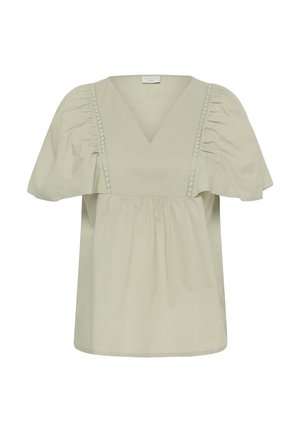 Svetlo béžová blúzka s hlbokým výstrihom do V, nazbieranými puff rukávmi a vertikálnou čipkovou ozdobou na prednom diele.