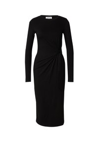 Zwarte lange mouw jurk van rekbare stof, met een gedraaide knoopdetail in de taille en een getailleerde pasvorm.
