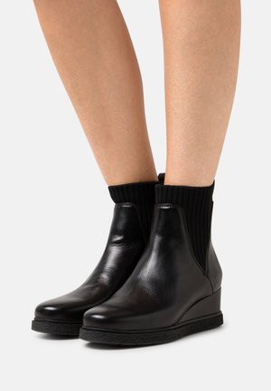 Unisa, Bottines compensées - black