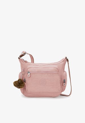 Roze nylon crossbodytas met verstelbare riem, voorvak met rits, reliëflogo, zijvak en een harige apensleutelhanger.