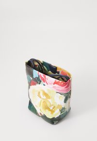 Piccola borsa a tracolla con motivo floreale multicolore, che mostra i manici e la parte superiore aperta con stampa floreale interna.