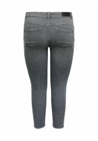 Rückansicht von grauen Skinny-Jeans mit zwei Gesäßtaschen, abgesteppten Nähten und einem kleinen Leder-Markenpatch am Bund.