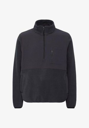 Tumehall fleece-pullover, millel on kõrge kaelus, pool-zip sulgemine, eesmine tõmblukuga tasku ja küljetaskud. Sujuv tekstuur, mugav lõige.