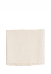 Coperta beige con una texture morbida, caratterizzata da un motivo sottile e bordi frangiati. Realizzata in tessuto leggero.