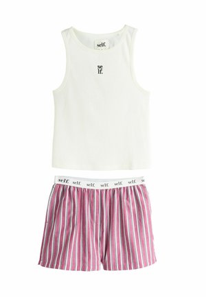 White sleeveless ribbed tank top with "self." text paired with pink, white, and navy vertical striped shorts with "self." printed waistband.
