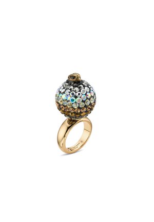 Gold-tone ring featuring a round textured top adorned with multicolored rhinestones in a gradient pattern, with a decorative accent on top.