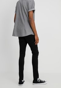 River Island Vaqueros pitillo - off-white