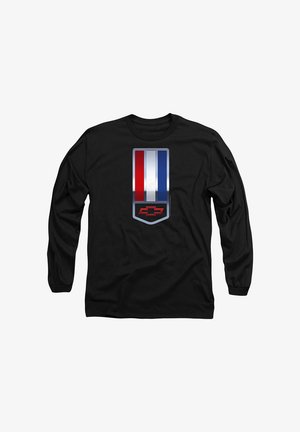 Long-sleeve black shirt featuring a prominent Chevrolet badge design in silver, with vertical red, white, and blue stripes.