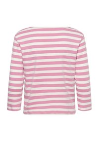 Garām piedurknēm topiņš rozā un baltās svītrās ar apaļu kakla izgriezumu un brīvu piegriezumu, izgatavots no mīksta kokvilnas auduma.