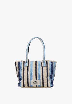 Bolsa de lona con rayas verticales azules y beige, con la marca "V°73 Venezia" y dos asas largas para llevar al hombro.