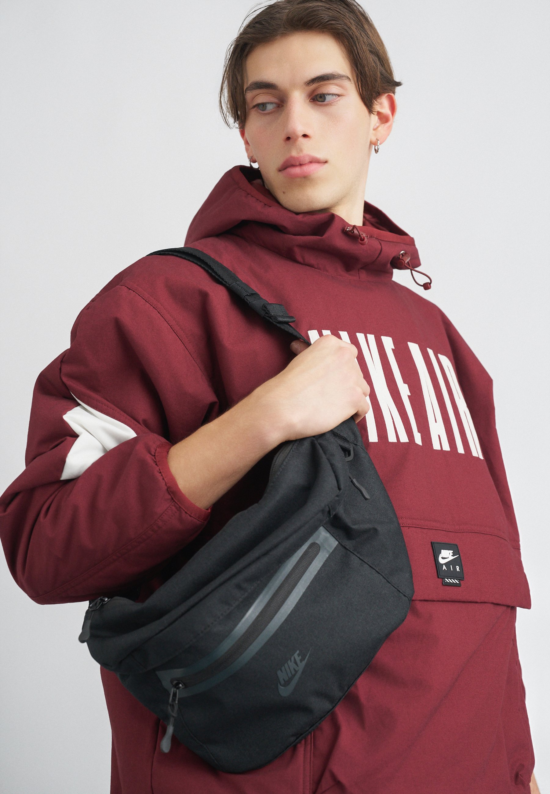 nike jacket that turns into a bag